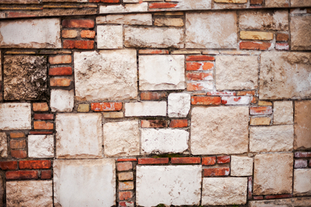 Wall from various shapes of bricksの写真素材