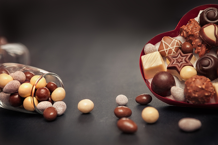 Heart shaped box and glass with chocolate truffles for Valentines Day, Valentines Day conceptの写真素材