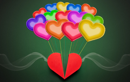 Red heart box with colorful balloons in the background, Valentines Day conceptの写真素材