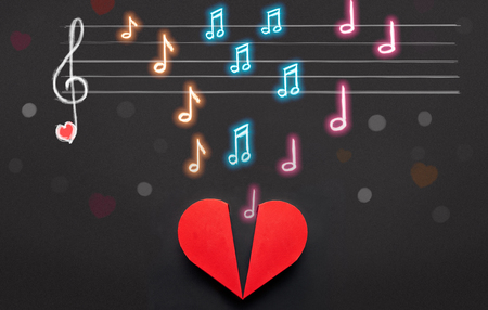 Colorful music notes and note scale above red heart box, Valentines Day conceptの写真素材