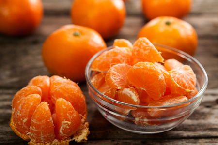 Bowl of delicious sweet juicy clementineの写真素材