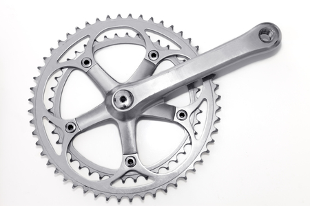 Bike crank set and chain ring on white background