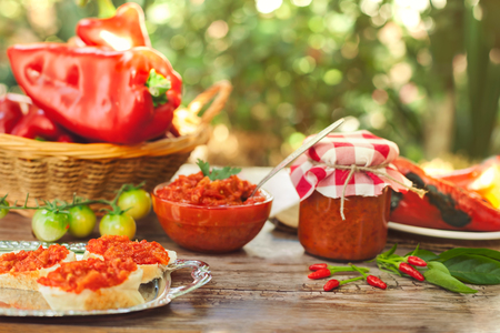 Delicious Ajvar served on bread to eat の写真素材