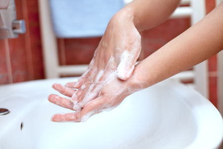 Soapy hands. Hand cleaning with soap. Hand hygiene.の写真素材