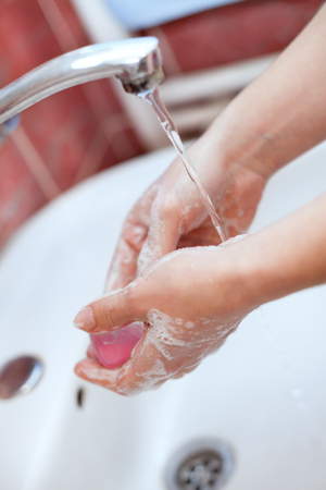 Washing hands with soap. Cleaning hands. Hands hygiene.  の写真素材