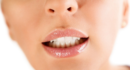 sensual open mouth with natural lips and white teeth, close upの写真素材