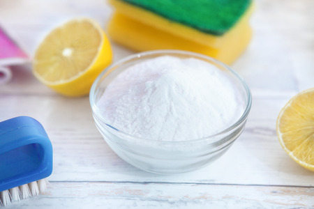 Eco-friendly natural cleaners, baking soda and lemonの写真素材