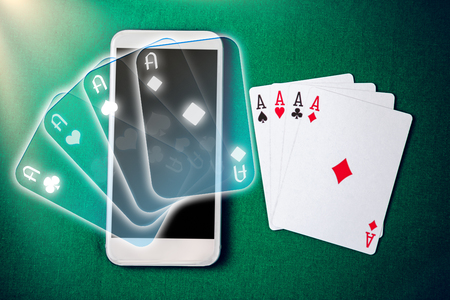Mobile casino. Poker table on screen of smartphone. Online casino on smartphone. Online gambling.
