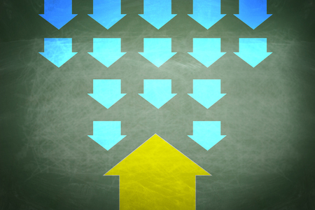 Yellow and blue arrows in pointing in opposite directions. Concept of contradiction.の写真素材