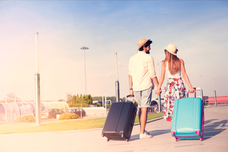 Back side of traveler couple, freedom and active lifestyle conceptの写真素材