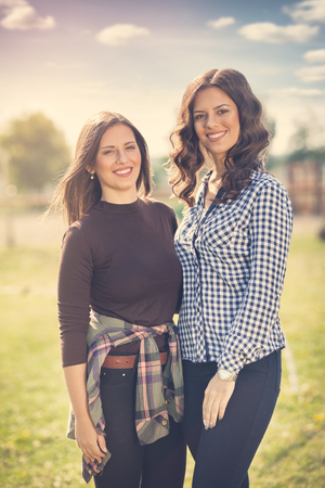 Portrait of two beautiful young woman, concept beautiful and nature の写真素材