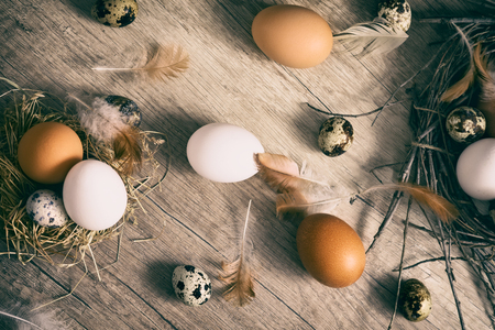 eggs on wooden background, different kinds of Easter eggsの写真素材