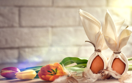 Eggs with bunny ears, funny decoration for Easterの写真素材