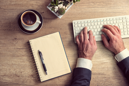 Accountant finger job modern lifestyle web search assistant enter account login password and note credentialの写真素材