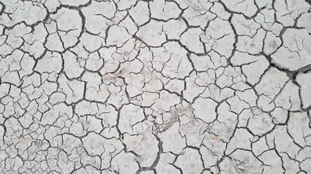 Climate change concept, the ground is dry, cracked groundの写真素材