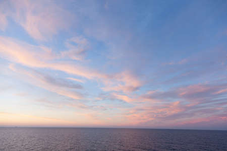 Scenic view of beautiful sunrise above the sea.の写真素材