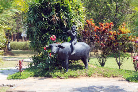 bronze statue of a cowboy and his cattleの写真素材