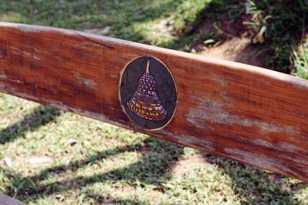 symbol of borobudur on the back of a public benchの写真素材