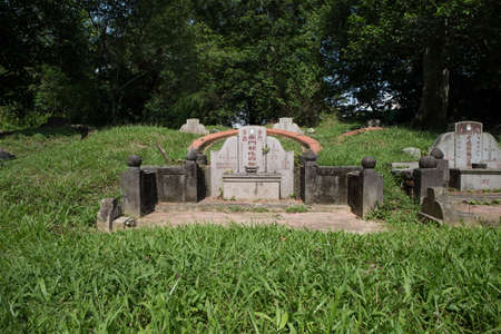 tombstone at Bukit Brown Cemeteryのeditorial素材