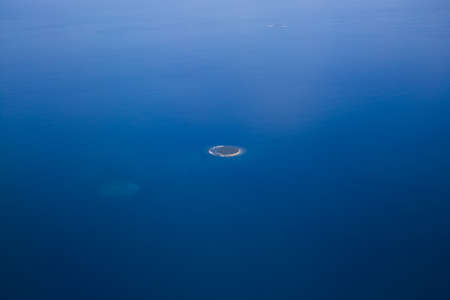 View of small islands in the oceanの写真素材