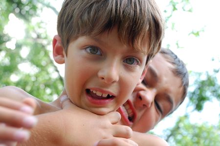 boys fightingの写真素材