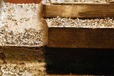 golden metal construction covered with filingsの写真素材