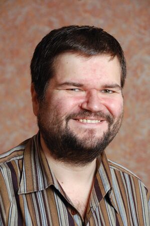 headshot of a smiling fat man の写真素材