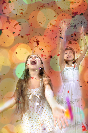 Christmas portrait of happy children against bright background