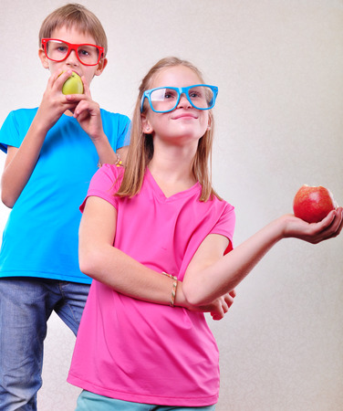 group portrait of funny kids with apples posingの写真素材