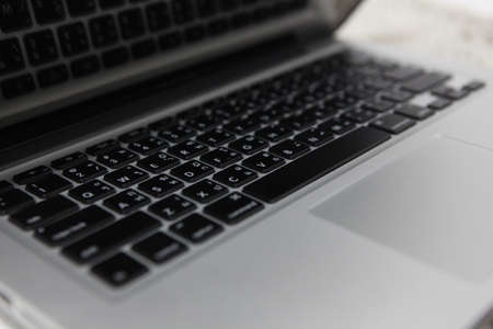 Laptop keyboard isolated against a white background の写真素材