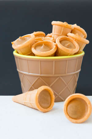 Waffle tubes in an, ice cream cupの写真素材