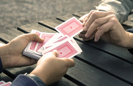 Two people playing cards.のeditorial素材