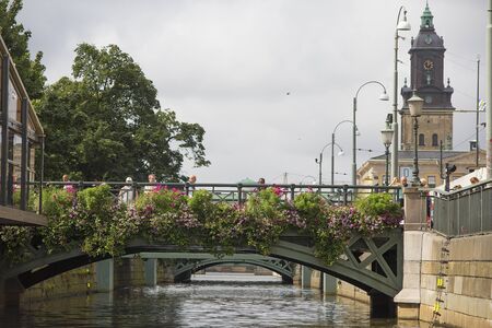 Gothenburg, Sweden - August 9, 2016. People crossing one of many bridges in Gothenburg.のeditorial素材