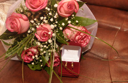 Roses and golden ringの写真素材
