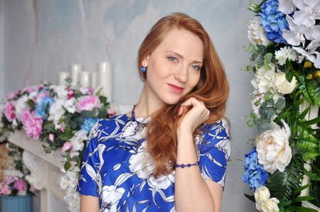 Beautiful young girl in blueの写真素材