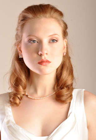 Portrait of red-haired girlの写真素材