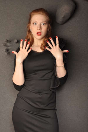 Girl in black dress scared castの写真素材