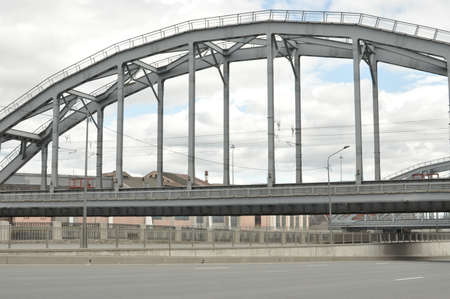 View of the bridge over the asphalt roadのeditorial素材