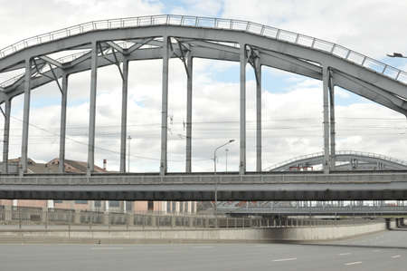 View of the bridge over the asphalt roadの写真素材