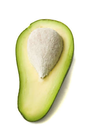 Half avocado isolated on white background
