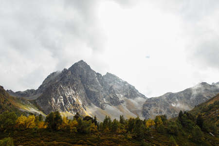 Mountain peak in the clouds of the Caucasus, Russia