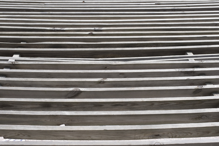 parallel boards for a canopy on the beachの写真素材
