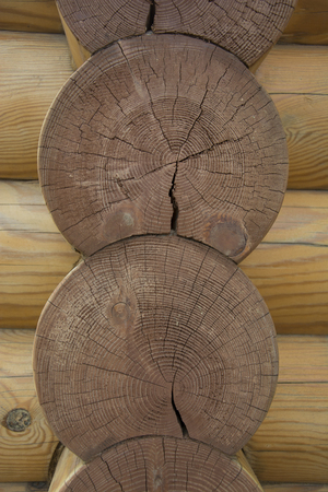wooden logs with annual rings the houses put at constructionの写真素材