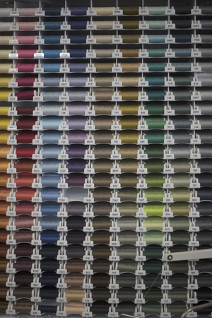 multi-colored sewing threadsの写真素材