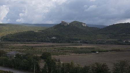 hills with a valley and the cloudsの写真素材