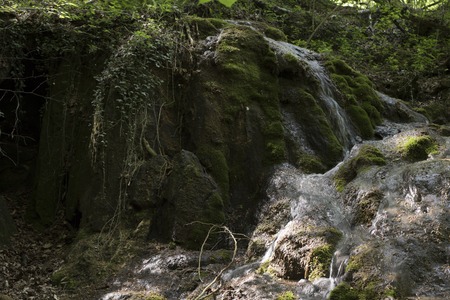 mountain waterfall on mossの写真素材