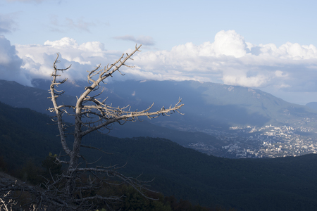 mountains with clouds and villageの写真素材