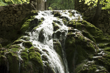 waterfall on the rocksの写真素材
