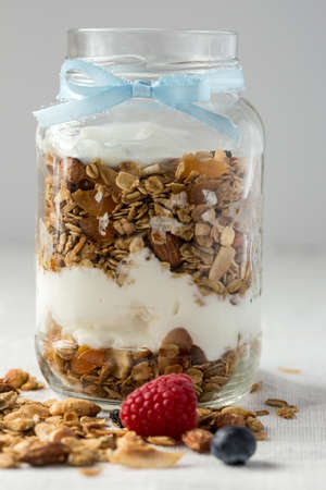 Jar Layered with Granola and Yogurtの写真素材