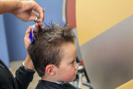 Cute Boy getting Haircut